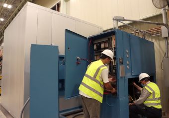 Alltest technicians installing environmental chamber